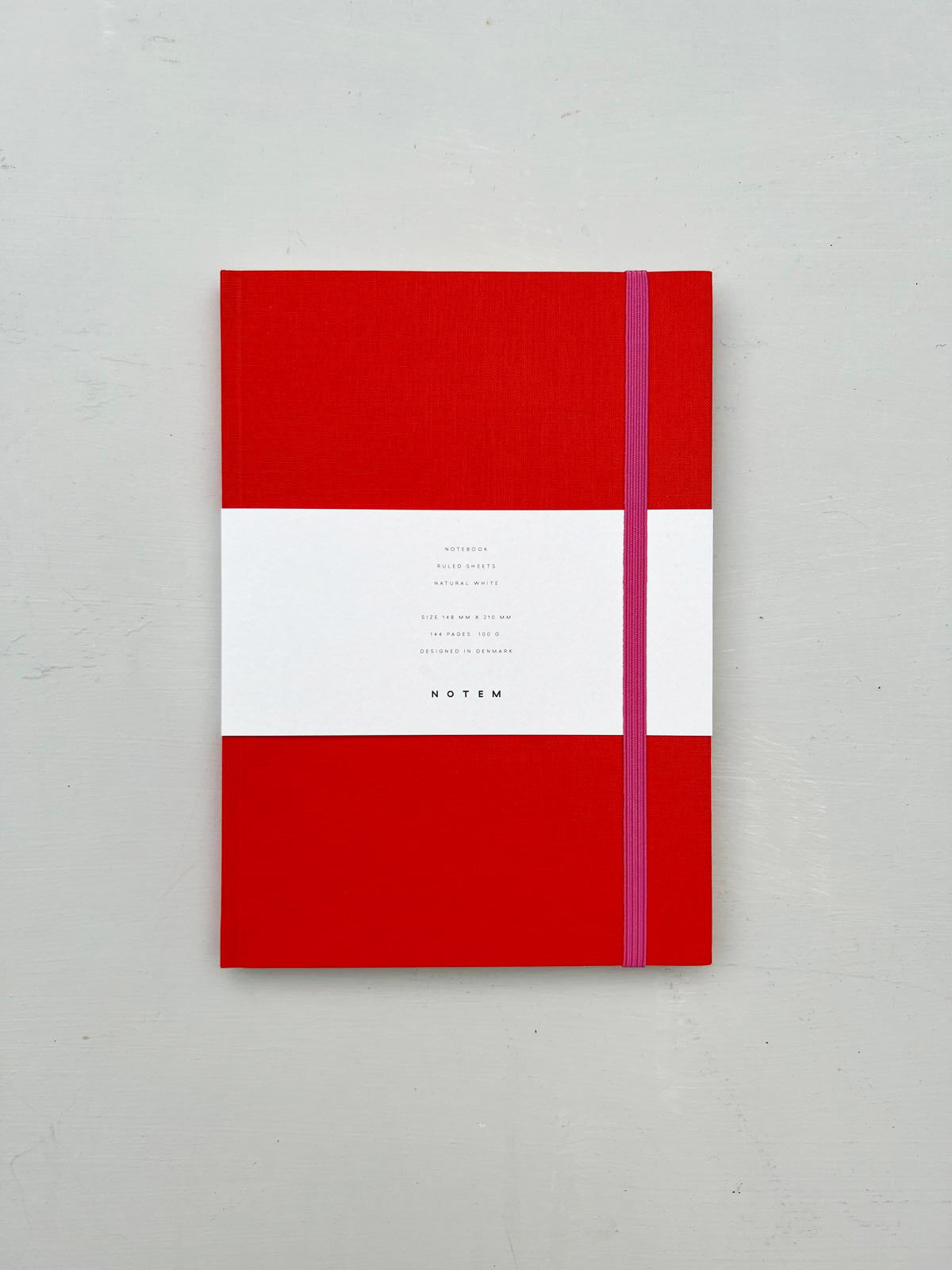 Notem notebook with elastic band