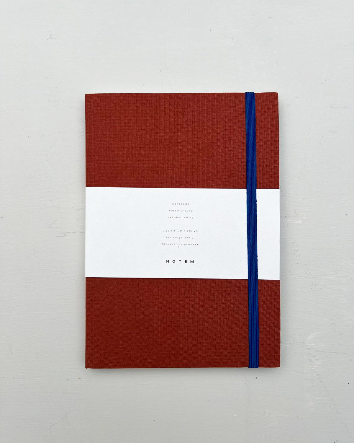 Notem notebook with elastic band