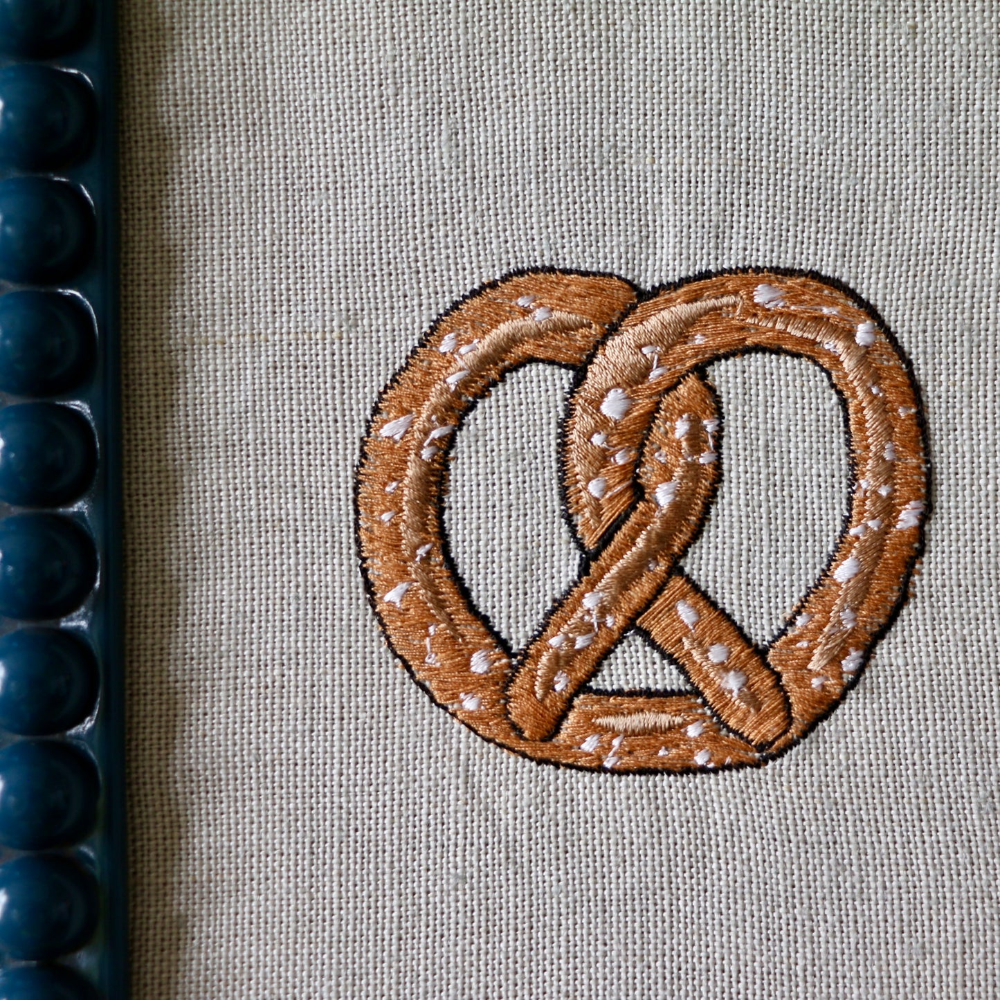 ‘Pretzel'  Framed Embroidery by Edith Cartoonist x Hannah Cummings